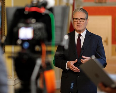 Starmer in front of a video camera