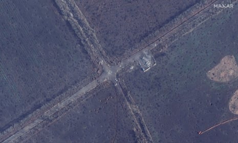 Satellite view of shell craters at the E40 highway intersection northeast of Bakhmut.