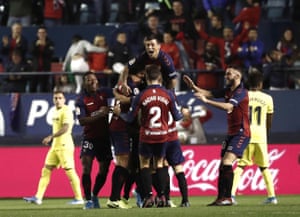 Osasuna’s players celebrate.