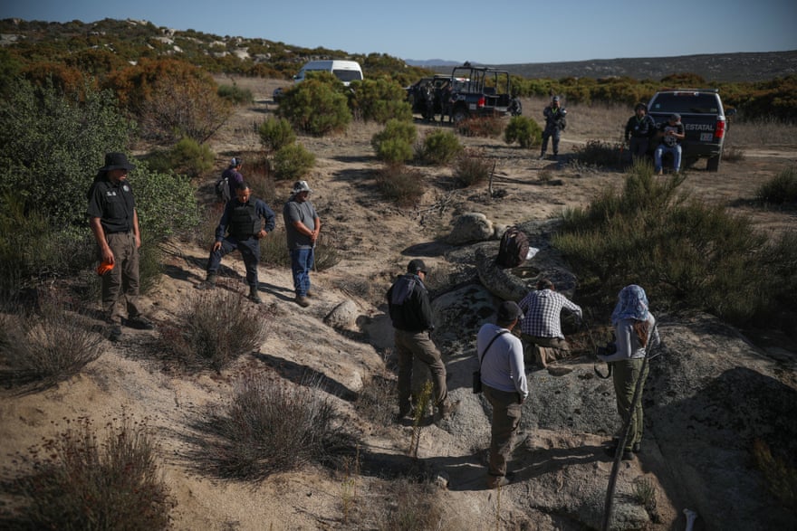 Forensic experts work with police protection during a search for the body of José Barajas last month. José was dragged from his ranch near the town of Tecate on 8 April, 2019 and has not been seen since
