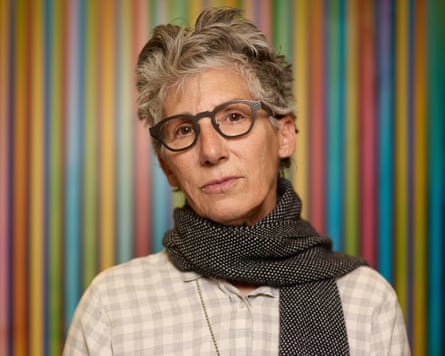 Artist with glasses look straight ahead