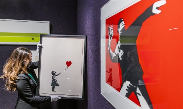 Versions of Banksy’s Girl with Balloon and Love is in the Air at Bonhams’ auction house in London