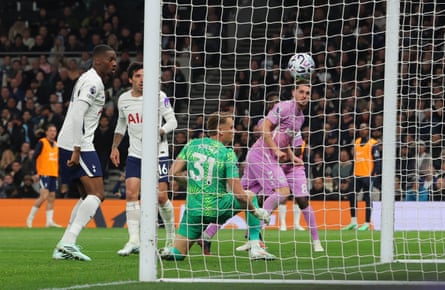 Jack RudoniâÂÂs shot flies toward goal as the goalkeeper dives, Tottenham v Coventry