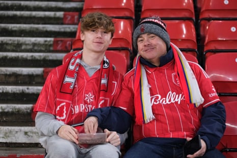 Two Nottingham Forest fans and one tupperware box of … I’m saying, chocolate raisins.