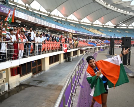 Fans salute India’s Preeti Pal’s silver medal in the women’s T35 100m