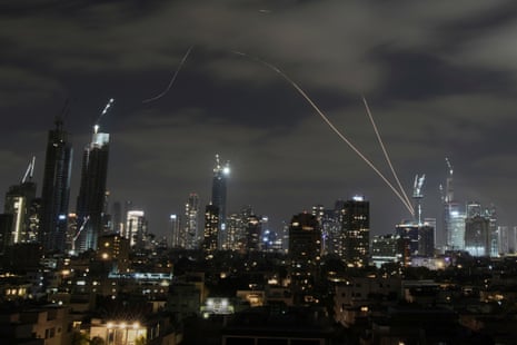 The Israeli Iron Dome air defense system fires to intercept missiles over Tel Aviv, Israel, Sunday, June 15, 2025.