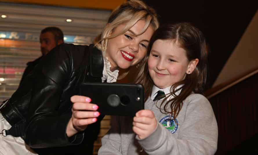 Saoirse-Monica Jackson poses with a young fan after the launch of Derry Girls series three at the Omniplex cinema in Derry