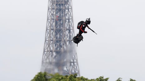 Jet-powered flyboard steals the show at France's Bastille Day celebrations – video