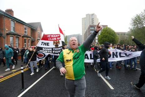 Manchester United fans protest against the Glazer family’s ownership of the club outside the stadium before their match with Aston Villa at Old Trafford