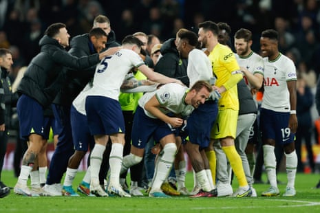 Harry Kane is congratulated by team-mates after the match.