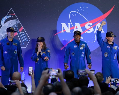Jeremy Hansen,Christina Koch,Victor Glover,Reid WisemanThe Artemis II crew, from left, Jeremy Hansen, Christina Koch, Victor Glover and Reid Wiseman acknowledge the crowd as they take the stage during a crew return event Saturday, April 11, 2026, at Ellington Airforce Base in Houston. (AP Photo/Michael Wyke)