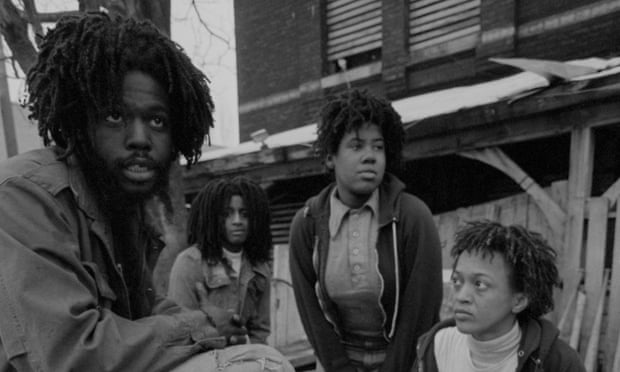 Delbert Africa and other members of Move, an organisation founded by John Africa, sit in front of their barricaded house in the Powelton Village section of Philadelphia.