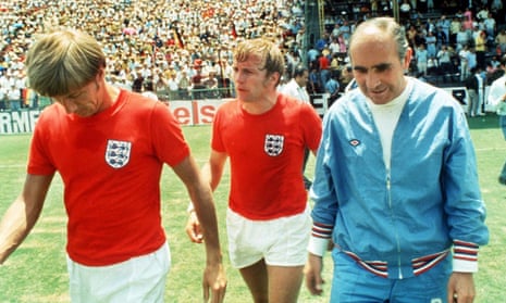 Sir Alf Ramsey leaves the field with Colin Bell and Francis Lee after England’s 3-2 defeat by West Germany in the 1970 quarter-finals