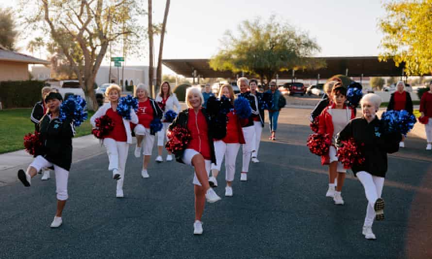 Members of the Sun City Poms cheerleading group practise marching and dancing in unison