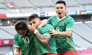 Mexico’s Alexis Vega (centre), celebrates his goal.