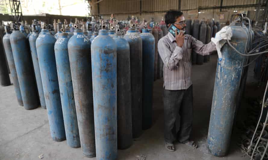 Medical oxygen cylinders being refilled at a charging station in Uttar Pradesh state.