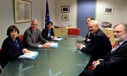 Barnier, Davis and their delegations at a meeting in Brussels.