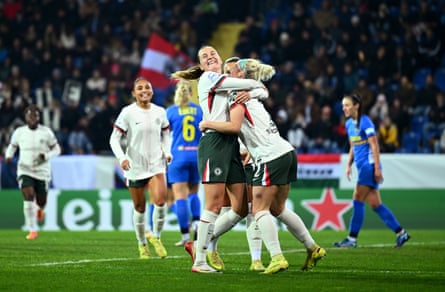 Wieke Kaptein receives the adulation of her teammates after opening the scoring for Chelsea