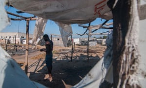 Ahmed Alheji, from Nigeria, pictured before Wednesday’s mass eviction under a tent he lived in for five years at Reggio Calabria, Italy 3000.jpg?width=300&quality=85&auto=forma