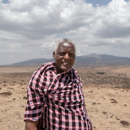 Ole Seki pictured in dry, rocky landscape with hills in background
