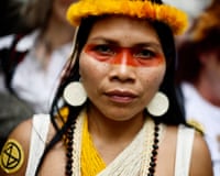 BRITAIN-CLIMATE-NATURE-POLITICS-DEMONemonte Nenquimo, Indigenous activist and member of the Waorani Nation from the Amazonian region of Ecuador, takes part in the "Restore Nature Now" protest supported by Extinction Rebellion (XR), National Trust and WWF in London on June 22, 2024. (Photo by BENJAMIN CREMEL / AFP) (Photo by BENJAMIN CREMEL/AFP via Getty Images)