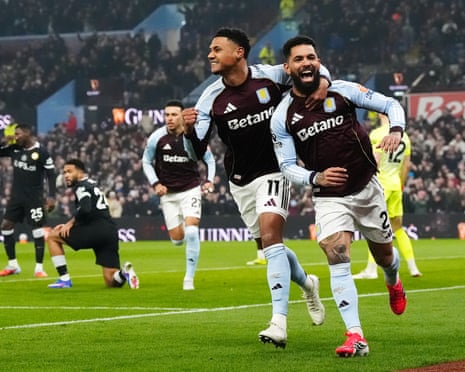Aston Villa’s Douglas Luiz (right) celebrates with Ollie Watkins giving the home side a very early lead against Chelsea.