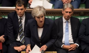 Theresa May updates MPs in the House of Commons.