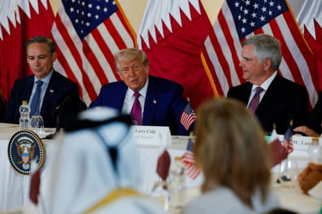 President and CEO of Boeing Kelly Ortberg, US president Donald Trump and chair and CEO of GE Aerospace Larry Culp attend a roundtable discussion in Doha, Qatar.