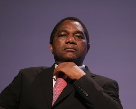 A middle-aged African man in a dark suit