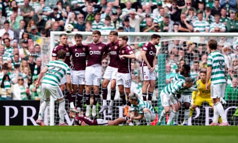 Celtic’s Arne Engels curls his free-kick over the wall and wide of the Hearts goal.