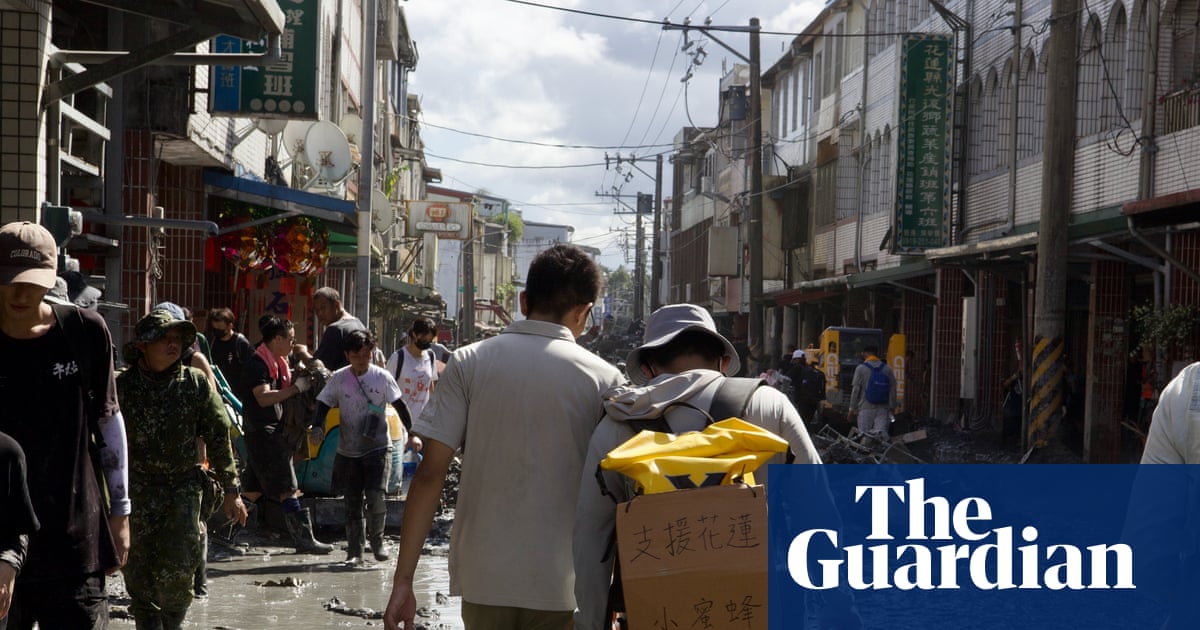 Gym bros, monks, retirees: thousands descend on Taiwan town to clean up after devastating flood