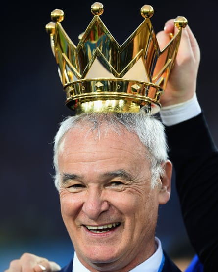 Claudio Ranieri with the crown of the Premier League trophy above his head