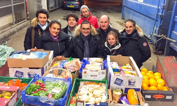 Arash Derambarsh (centre) began his drive to fight food waste and food poverty in Courbevoie, north-west of Paris. 