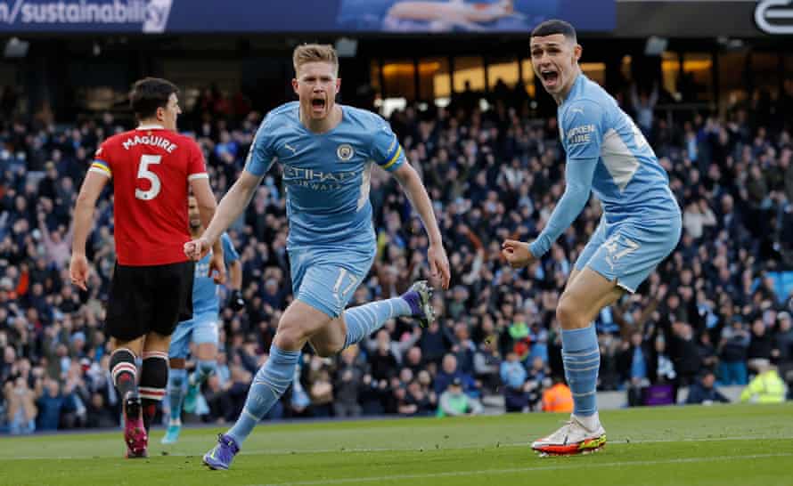 Kevin De Bruyne celebrates after scoring the first goal in Manchester City’s 4-1 win over neighbours United at the Etihad in March 2022.