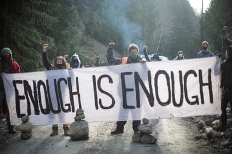 Activists block a logging road to oppose the cutting of old growth trees in the Caycuse watershed on southern Vancouver Island.