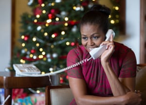 Michelle Obama on the phone to children as part of the annual Norad Tracks Santa programme