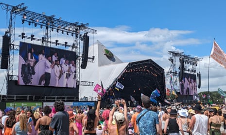 Raye performing on the Pyramid stage.
