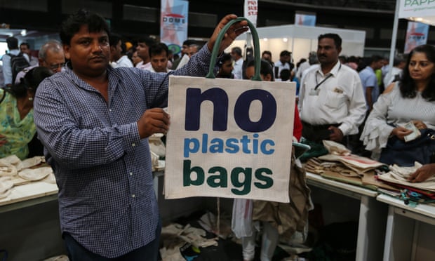 A man displays a jute bag at an exhibition in Mumbai last week to make people aware about the plastics ban