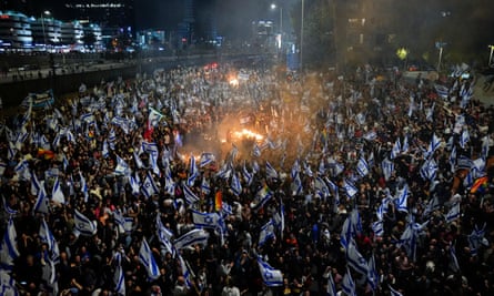 Israelis block a highway in Tel Aviv on Sunday 26 March