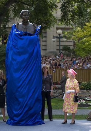 Canada, 2010: the Queen unveils a bronze statue of herself, created by sculptor Leo Mol in 1970, after it is placed in its new home at the Queen Elizabeth II gardens, Winnipeg