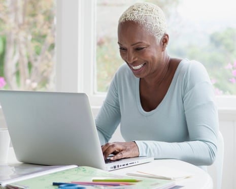 A woman browsing on a laptop