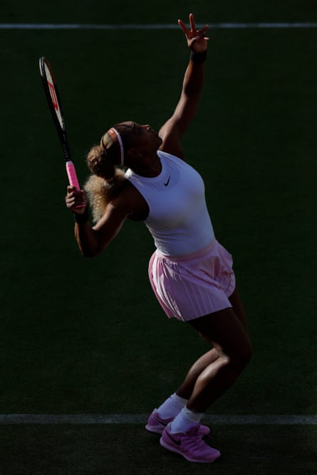 Serena Williams of the United States serves as she and Victoria Mboko of Canada take on Nicole Melichar-Martinez of the United States and Erin Routliffe of New Zealand.