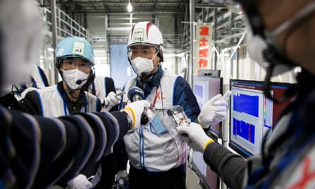 A Tepco employee speaks to the media at the company’s Fukushima Daiichi nuclear power plant.