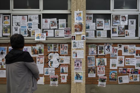 Posters of those missing in the Nepal flood