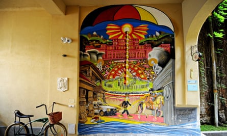 Mural on the outside wall of Umbrella Hostel, Bucharest.