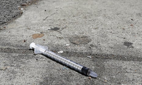 A discarded syringe on a sidewalk in San Francisco. 
