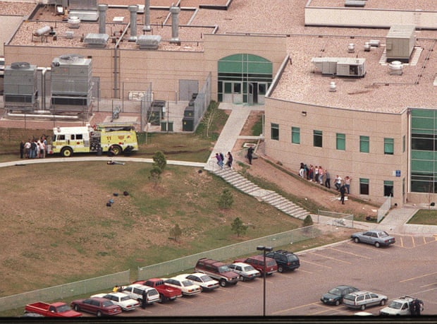 Students are led from Columbine high school on 20 April 1999