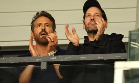 Wrexham co-owner Ryan Reynolds (left) with the actor Paul Rudd during the match against Boreham Wood on Saturday.