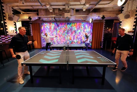 Customers playing at interactive Ping-pong X tables in the Bounce Ping-Pong Clu