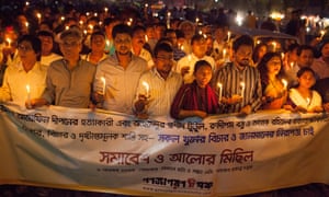 'I must survive to seek justice,' says widow of murdered Bangladesh blogger 17 People march behind a banner at a protest against the killing of atheist bloggers and publishers in Dhaka